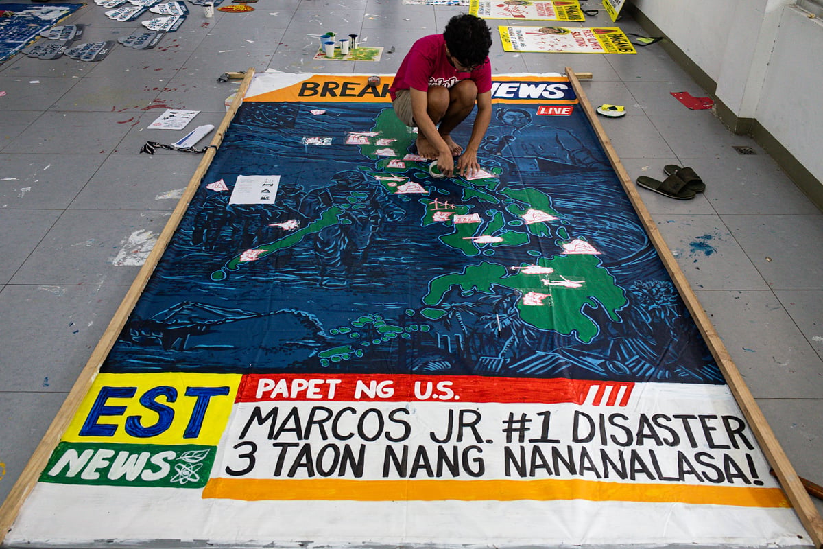 Environmental and climate advocates led by Kalikasan PNE and AGHAM create a "Typhoon Marcos" effigy on Sunday, 27 July 2025, ahead of President Ferdinand Marcos Jr.'s State of the Nation Address (SONA) on 28 July, which they say symbolizes the government's inaction on climate-related calamities.