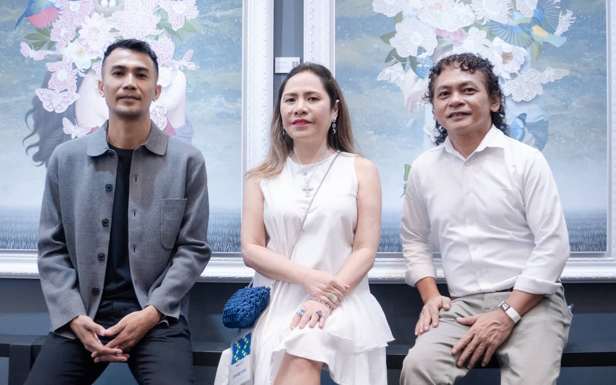 J Studio's Jia Estrella in the middle with artists Alvin Florentino and Norman Dreo..