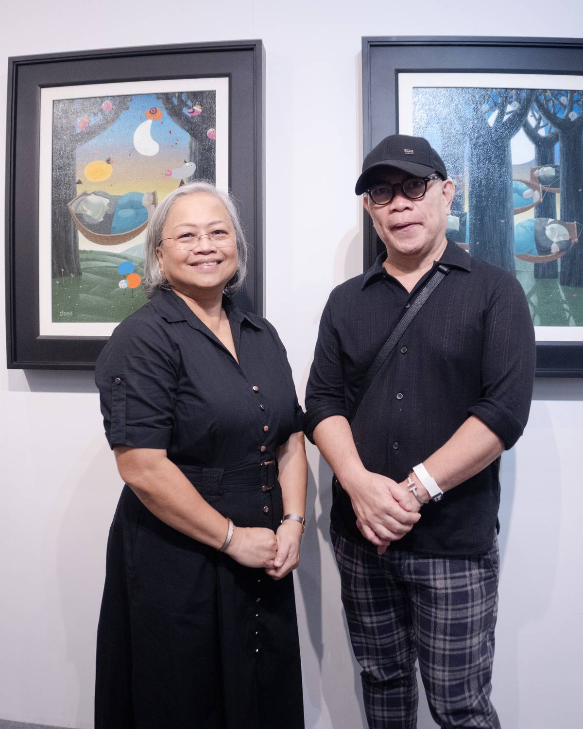 Art Lounge Manila's Susanne Tiausas and artist Roel Obemio.