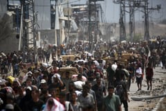 Aid trucks begin entering Gaza