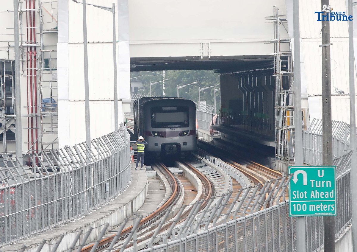 A Metro Rail Transit Line 7 (MRT-7) train is seen parked at Don Antonio Station along Commonwealth Avenue in Quezon City on Monday, July 28, 2025. The 22-kilometer elevated railway connecting Metro Manila to Bulacan via Commonwealth Avenue is expected to begin trial runs by the end of 2025, according to operator San Miguel Corporation.