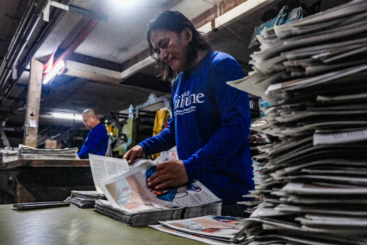 Amid the chaos in the publishing room emerges copies of the Daily Tribune that its readers follow daily for the latest news and hard-hitting opinions of its staff.