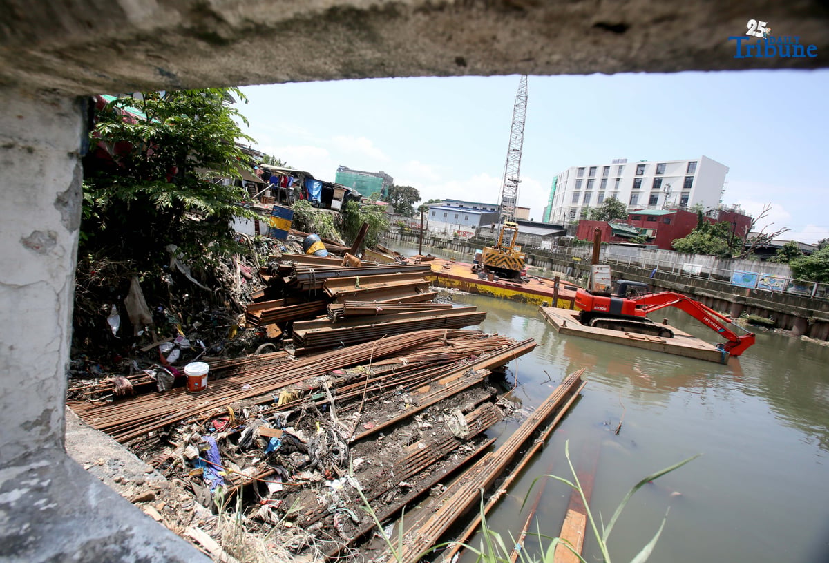 Steel sheet piles are seen at an ongoing Department of Public Works and Highways (DPWH) flood control project along the flood-prone San Juan River in Barangay Damayang Lagi, Quezon City. The construction activity comes a day after President Ferdinand Marcos Jr., in his fourth State of the Nation Address, ordered a review of all government flood control projects and a crackdown on corrupt officials linked to anomalies.