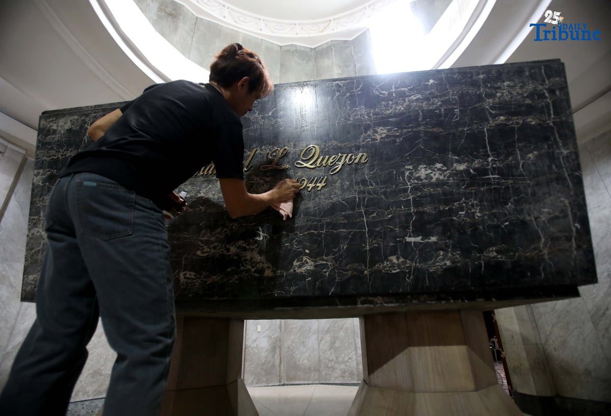 HONORING A HERO | Personnel from the National Historical Commission of the Philippines clean the tomb of President Manuel L. Quezon at the Quezon Memorial Circle in Quezon City on Thursday, July 31, 2025, ahead of the 81st anniversary of his death. Quezon, the second president of the Philippines, served from 1935 until his death in 1944.