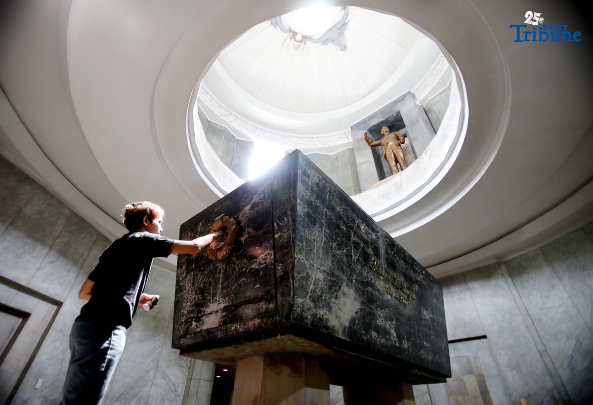 HONORING A HERO | Personnel from the National Historical Commission of the Philippines clean the tomb of President Manuel L. Quezon at the Quezon Memorial Circle in Quezon City on Thursday, July 31, 2025, ahead of the 81st anniversary of his death. Quezon, the second president of the Philippines, served from 1935 until his death in 1944.