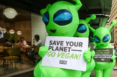 ‘Green Aliens’ invade Makati to protest animal agriculture