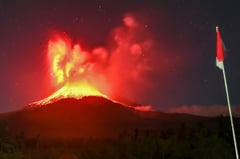Indonesia volcano belches six-mile ash tower