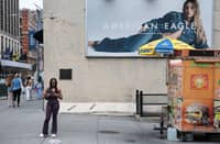 A billboard of actress Sydney Sweeney is seen outside of an American Eagle store on August 01, 2025 in New York City. American Eagle’s recent denim ad campaign featuring Sweeney has drawn backlash for language and imagery that critics say echoes eugenics-era rhetoric, following a tagline referencing “great genes” alongside visuals of Sweeney in blue jeans.