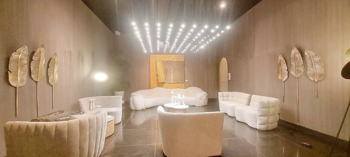 The orphanage’s formerly rusting roof has been turned into a golden painting that is now the crown jewel of this room.
