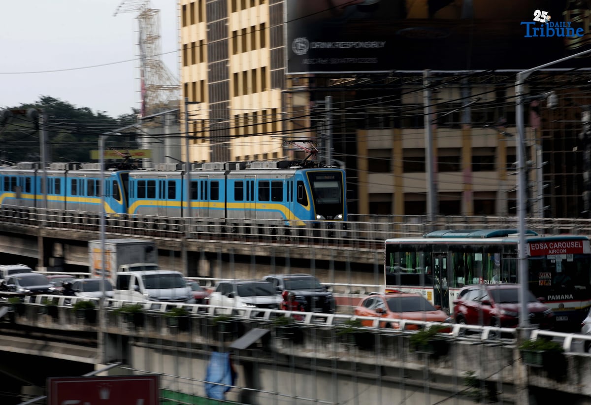 A Dalian train of the Metro Rail Transit Line 3 (MRT-3) is seen running along the tracks in Quezon City on Thursday, 31 July 2025—nearly a decade after being stored in the depot. The train’s reactivation marks a milestone in efforts to modernize the MRT-3 fleet.