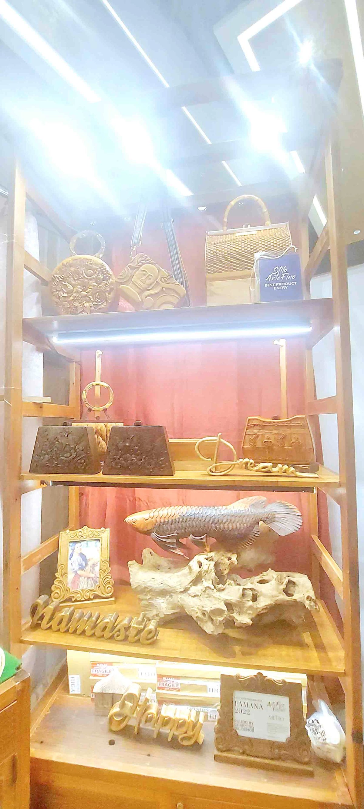 Clutch bags handcarved in Paete by Charming Baldemor.