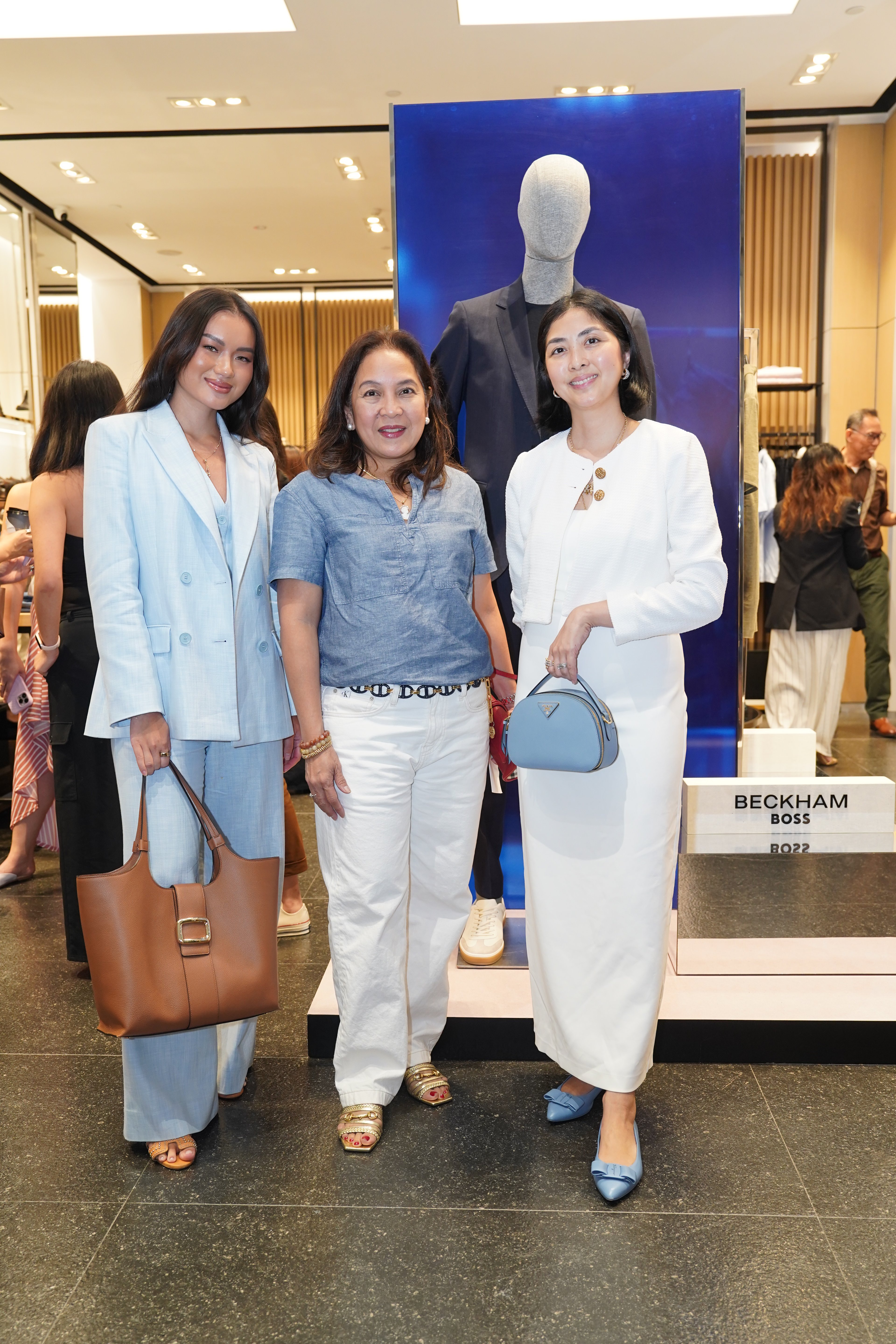 Nikki Huang of the SSI Group, April Reyes (SSI Merchandise Group manager) and Ina Garcia (SSI head of Marketing Communications).