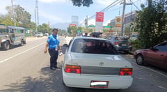 LTO handing ‘moto’ plates at checkpoints