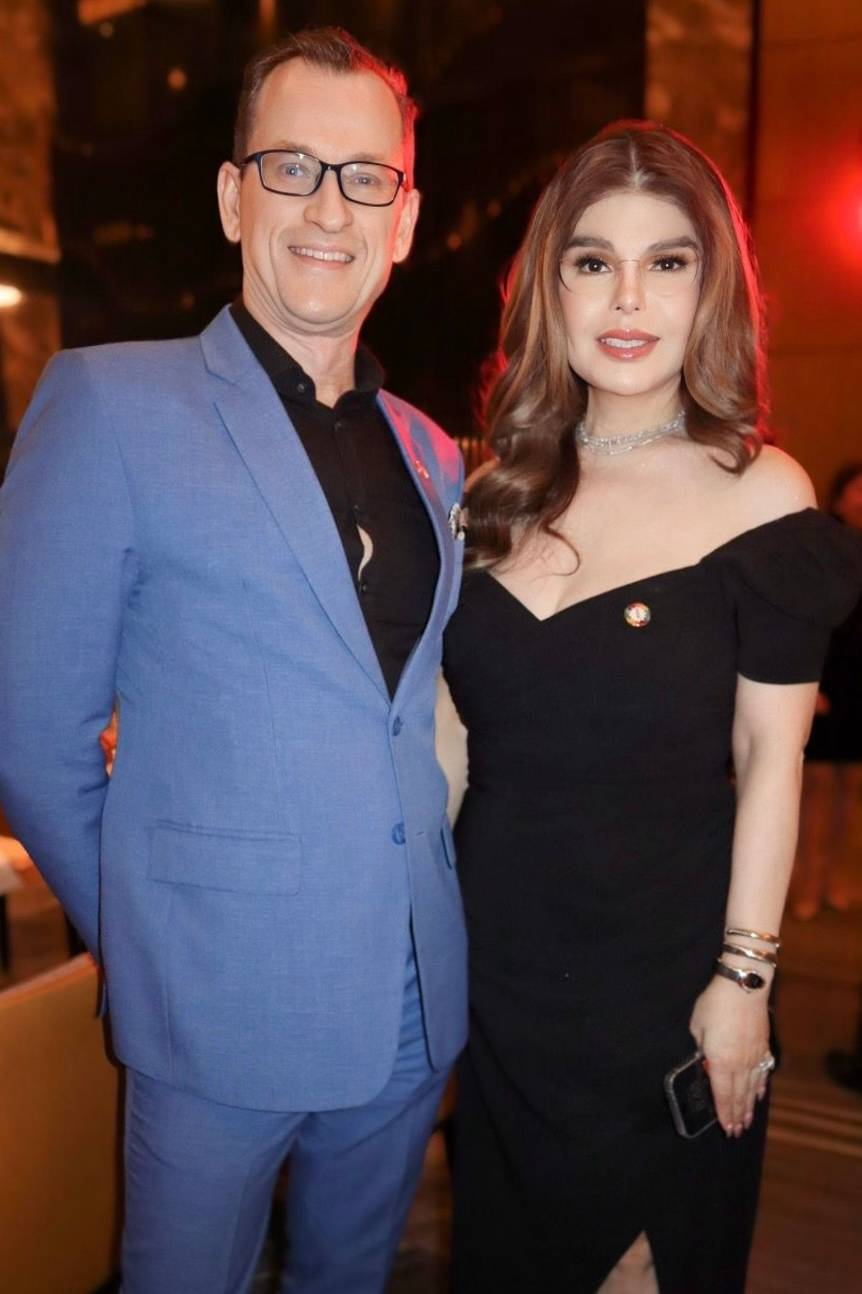 Newport World Resorts chief hospitality officer Hotel Operations John Lucas and Maria Barbie Arcache.