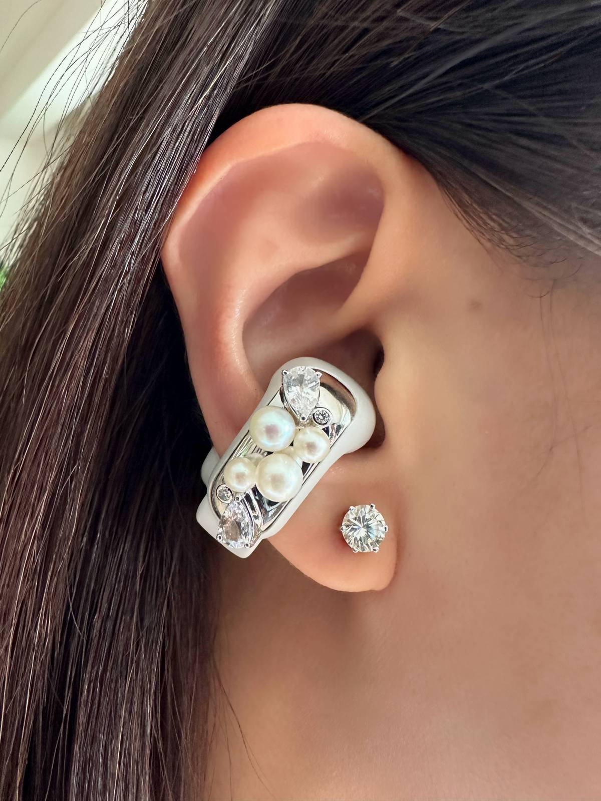 KDee x Bose Ultra Open earbuds with pearls, sapphires and diamonds.