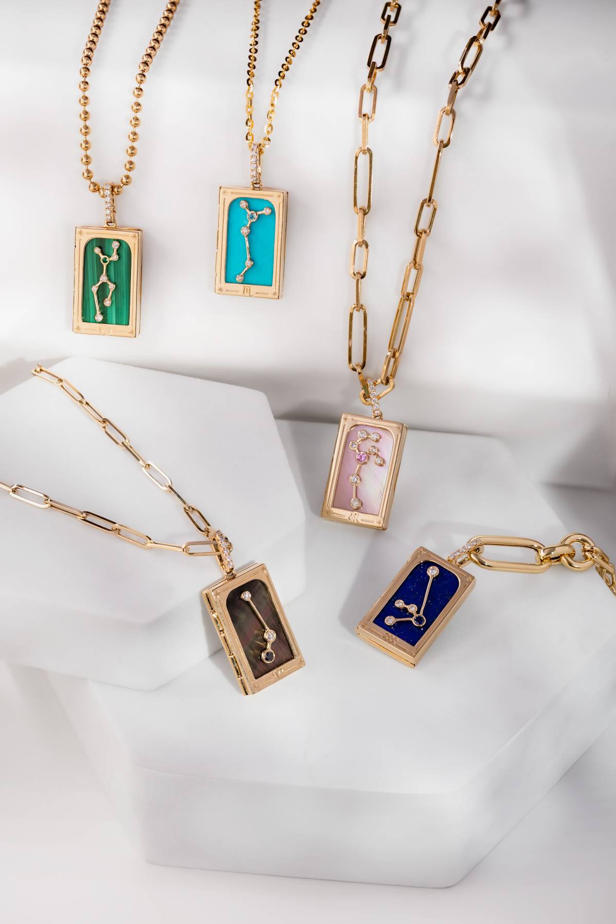 Enchanted Book pendant with green malachite, turquoise, pink mother of pearl, black mother of pearl and blue lapis lazuli.
