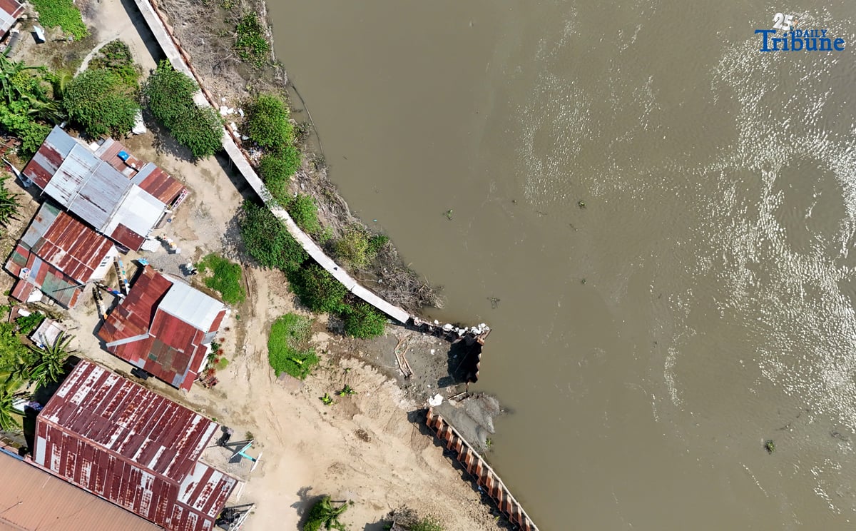 Department of Budget and Management (DBM) Secretary Amenah F. Pangandaman inspects the ongoing P91.4-million flood control project in Brgy. Candating, Arayat, Pampanga, which collapsed on August 17, 2024