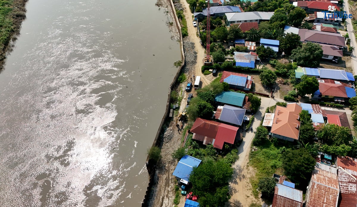 Department of Budget and Management (DBM) Secretary Amenah F. Pangandaman inspects the ongoing P91.4-million flood control project in Brgy. Candating, Arayat, Pampanga, which collapsed on August 17, 2024