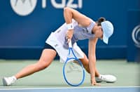 IGA Swiatek becomes the latest seeded player to fall after suffering a 7-6 (7/1), 6-3 loss to Dane Clara Tuason in the fourth round of the Canadian Open.