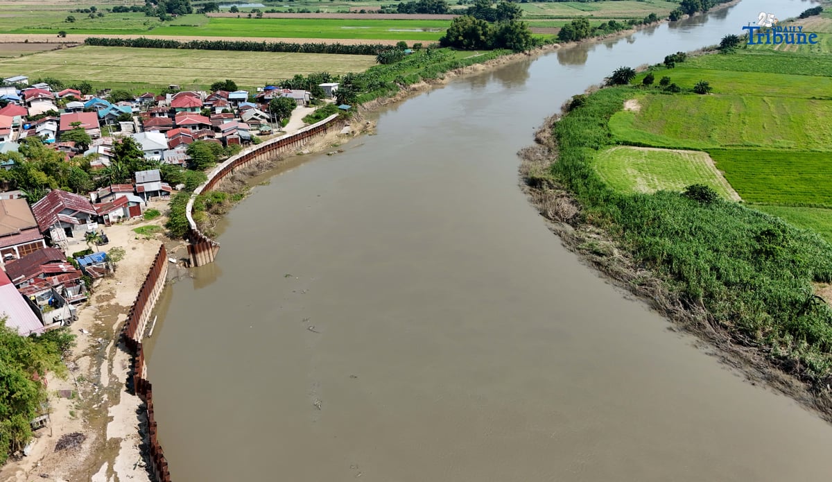 Department of Budget and Management (DBM) Secretary Amenah F. Pangandaman inspects the ongoing P91.4-million flood control project in Brgy. Candating, Arayat, Pampanga, which collapsed on August 17, 2024