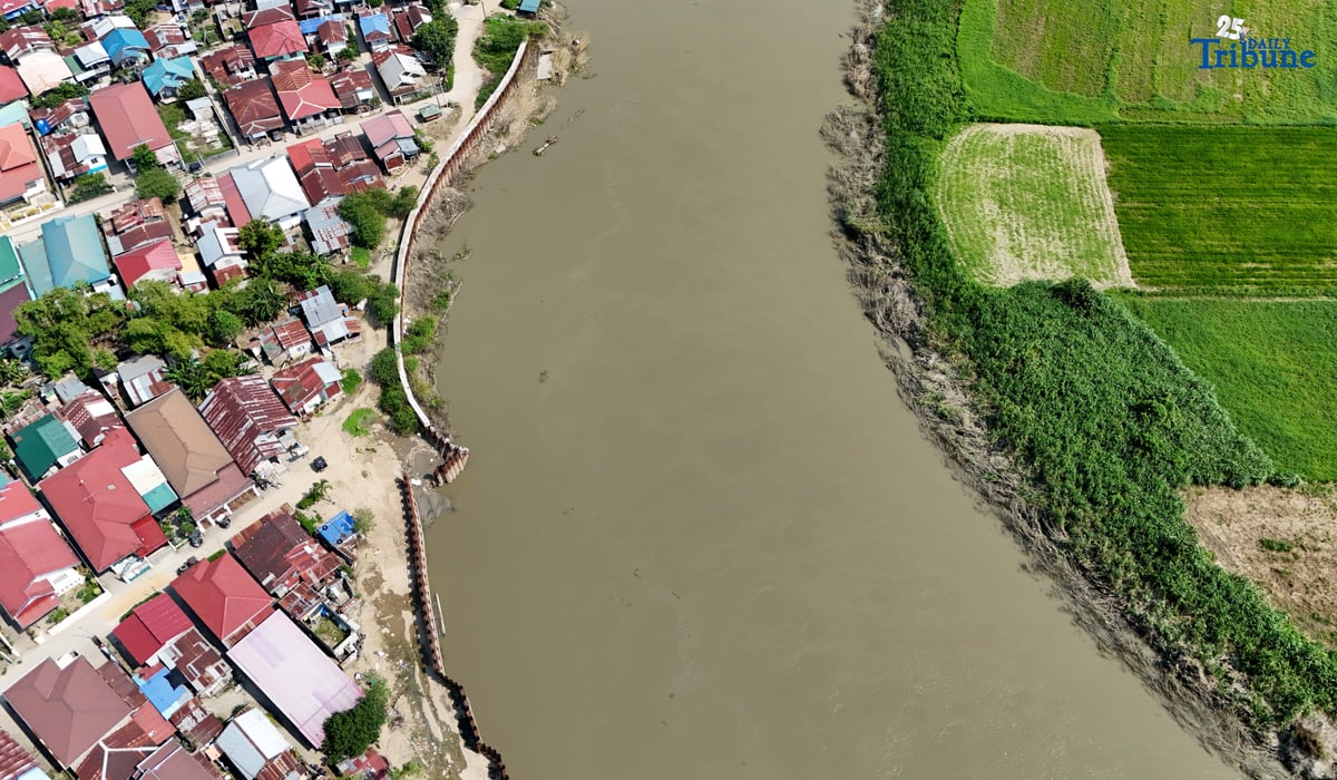 Department of Budget and Management (DBM) Secretary Amenah F. Pangandaman inspects the ongoing P91.4-million flood control project in Brgy. Candating, Arayat, Pampanga, which collapsed on August 17, 2024