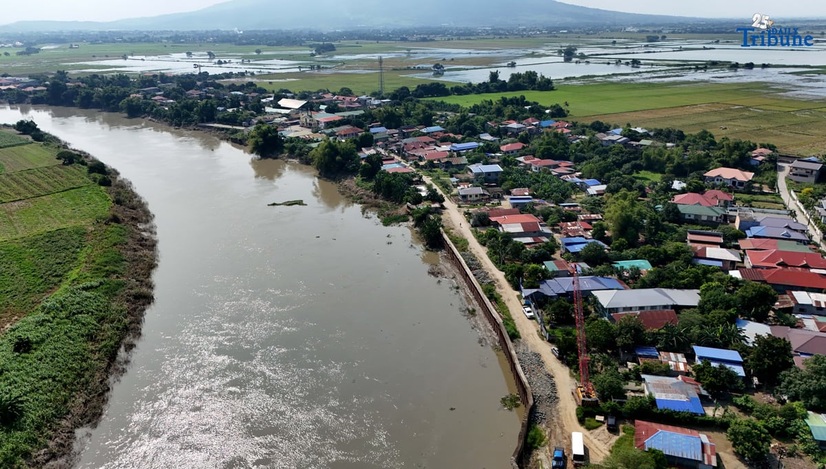 Department of Budget and Management (DBM) Secretary Amenah F. Pangandaman inspects the ongoing P91.4-million flood control project in Brgy. Candating, Arayat, Pampanga, which collapsed on August 17, 2024