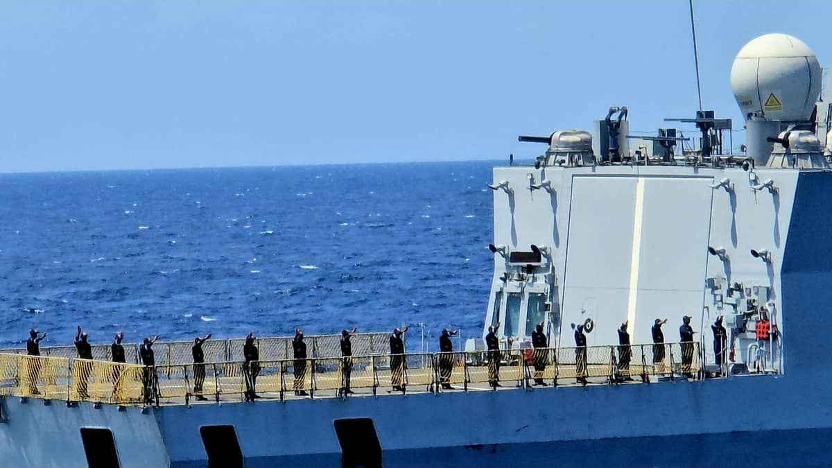 Indian Navy personnel aboard the INS Delhi (D61) are waving to Philippine Navy crew aboard the BRP Jose Rizal (FF160) during the passing exercise on Monday, August 4, 2025. This is part of the first-ever Maritime Cooperative Activity (MCA) between the Philippine and Indian military held in the vicinity of the West Philippine Sea. (Photo by Lade Kabagani )