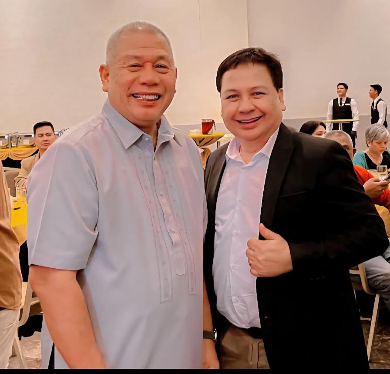 USJR president Fr. Eduardo Celiz and Jonathan Capanas of the USJR Alumni Association.