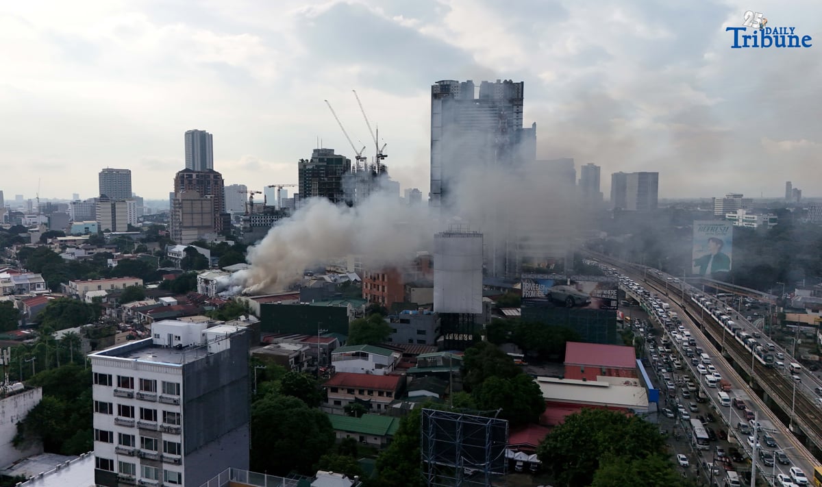 (August 06 2025) Smoke billows from a 2nd alarm fire involving a residential area along Scout Rallos in Barangay South Triangle, Quezon City on Wednesday, August 6, 2025. Photo/Analy Labor