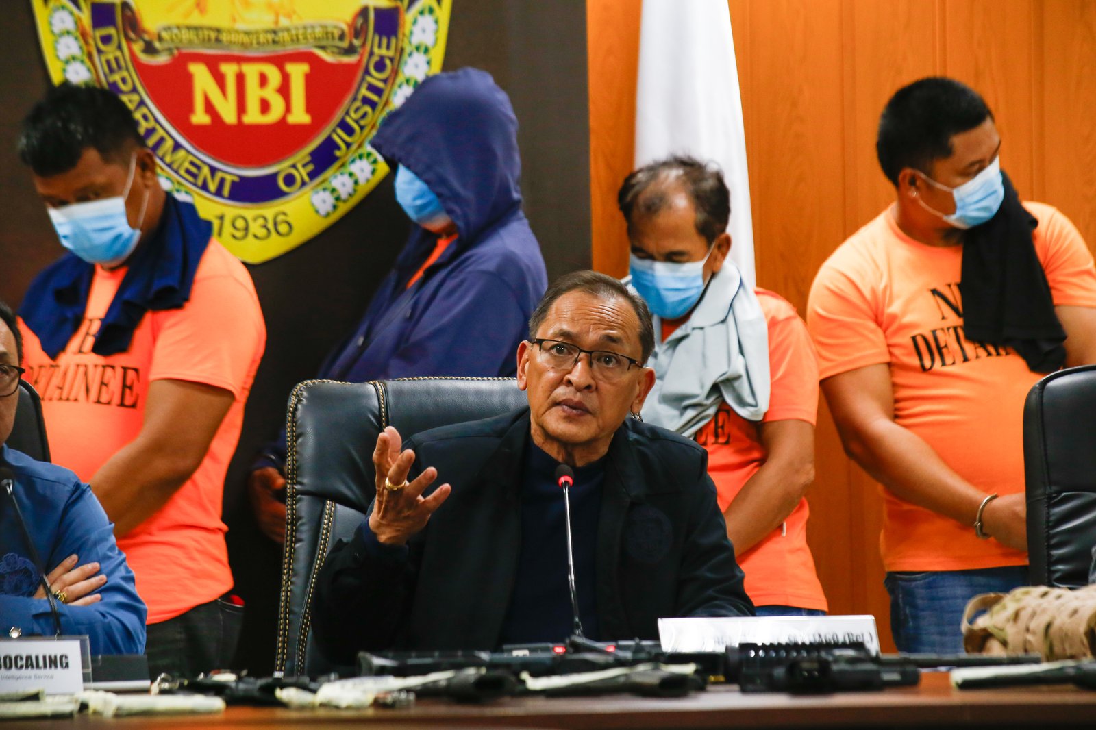 San Simon Mayor Abundio Punsalan Jr., along with his security detail, is presented by the National Bureau of Investigation in Pasay City on 7 August 2025. They were arrested Tuesday night in an entrapment operation over allegations of extortion. The mayor allegedly accepted an initial bribe of ₱30 million in exchange for a favorable local government resolution.