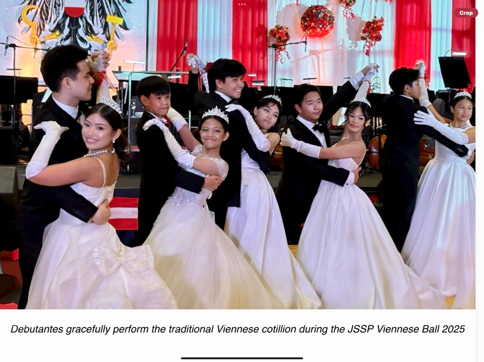 DEBUTANTES gracefully perform the traditional Viennese cotillion.