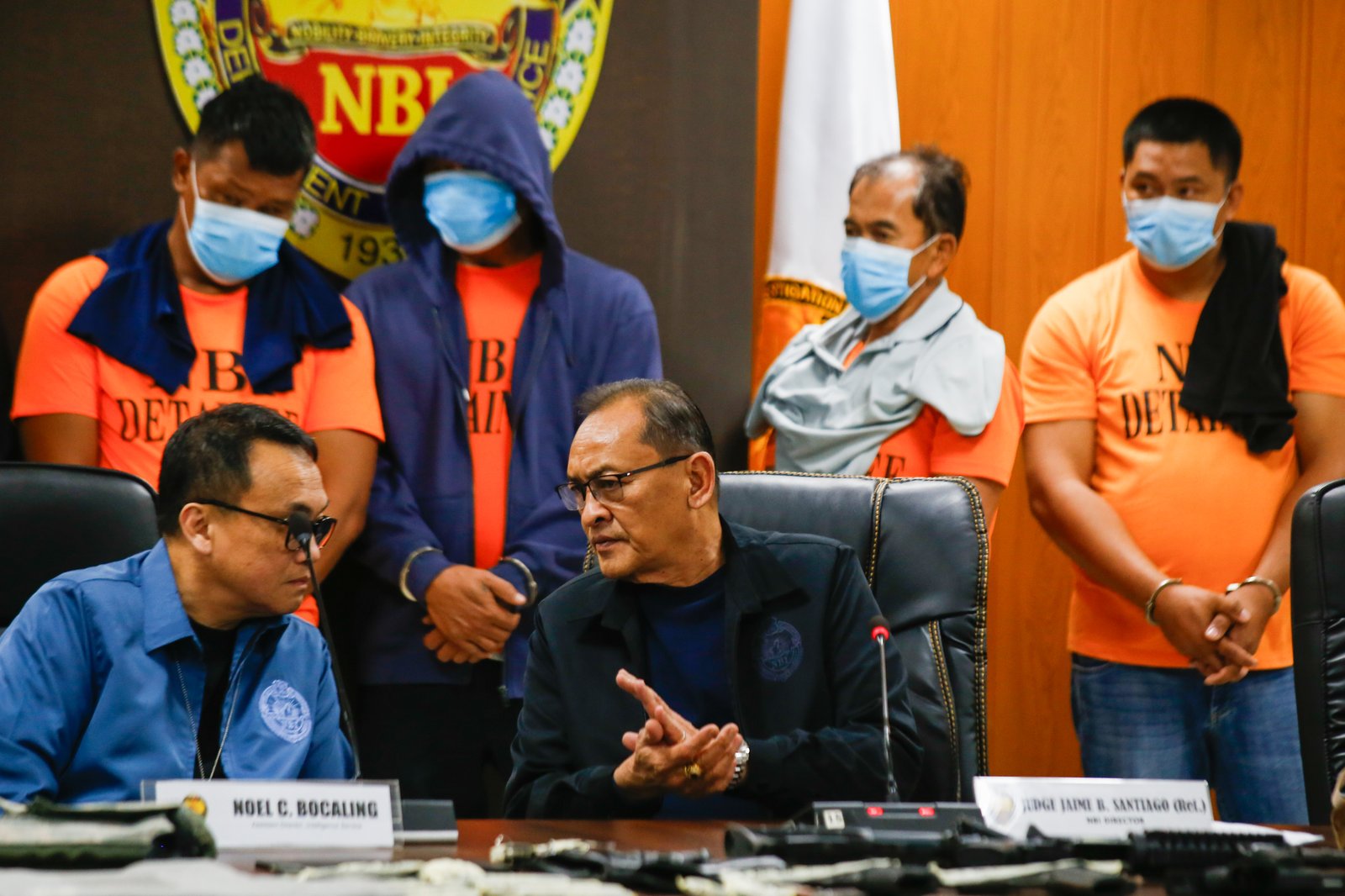 San Simon Mayor Abundio Punsalan Jr., along with his security detail, is presented by the National Bureau of Investigation in Pasay City on 7 August 2025. They were arrested Tuesday night in an entrapment operation over allegations of extortion. The mayor allegedly accepted an initial bribe of ₱30 million in exchange for a favorable local government resolution.