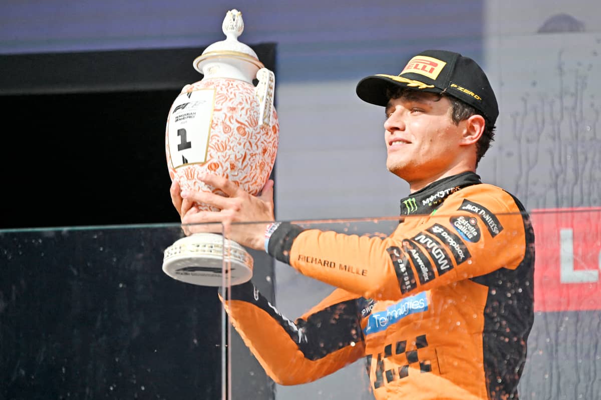 MCLAREN’s British driver Lando Norris raises his trophy as he celebrates on the podium after winning the Formula One Hungarian Grand Prix.