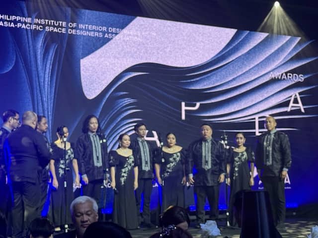 THE gala night formally opened with a performance from a choir.