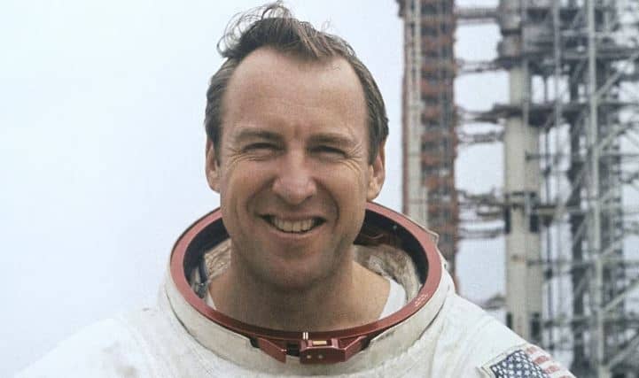 Lovell poses for a photo in his space suit in February 1970. He was part of four space flights during his career as an astronaut.