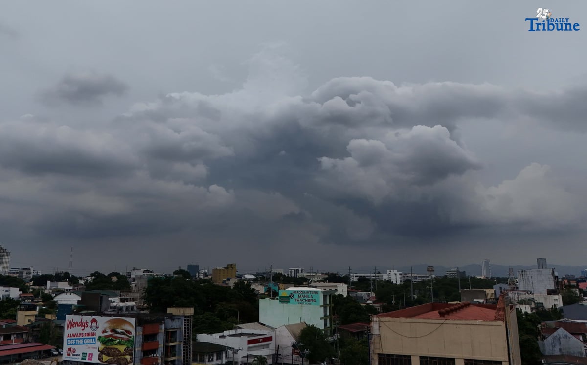 Dark clouds blanket Metro Manila’s skyline, as seen from Quezon City on Saturday, ahead of the possible entry of Severe Tropical Storm Pudol into the Philippine Area of Responsibility by Sunday evening or Monday afternoon, according to PAGASA.