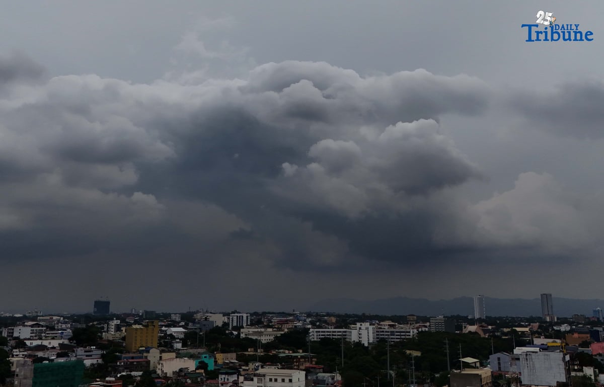 Dark clouds blanket Metro Manila’s skyline, as seen from Quezon City on Saturday, ahead of the possible entry of Severe Tropical Storm Pudol into the Philippine Area of Responsibility by Sunday evening or Monday afternoon, according to PAGASA.