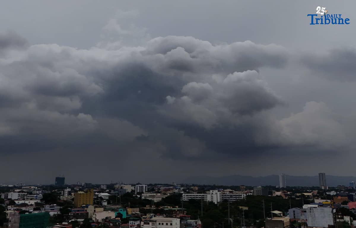 Dark clouds blanket Metro Manila’s skyline, as seen from Quezon City on Saturday, ahead of the possible entry of Severe Tropical Storm Pudol into the Philippine Area of Responsibility by Sunday evening or Monday afternoon, according to PAGASA.