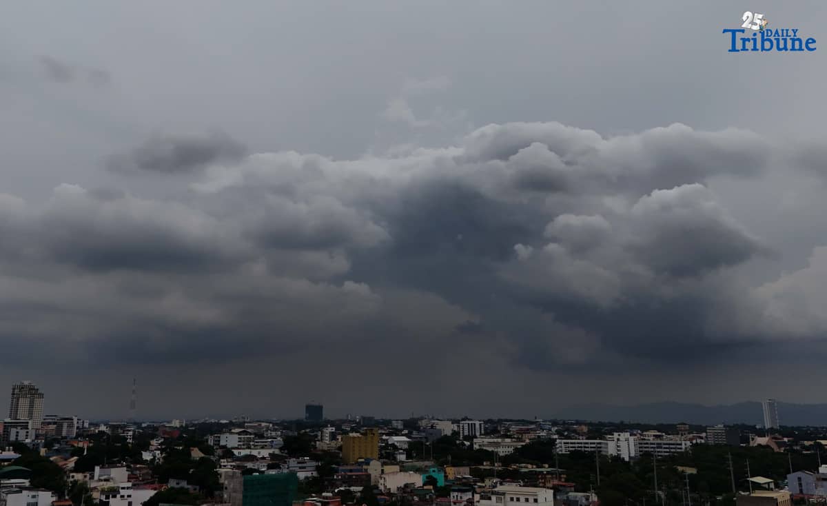 Dark clouds blanket Metro Manila’s skyline, as seen from Quezon City on Saturday, ahead of the possible entry of Severe Tropical Storm Pudol into the Philippine Area of Responsibility by Sunday evening or Monday afternoon, according to PAGASA.