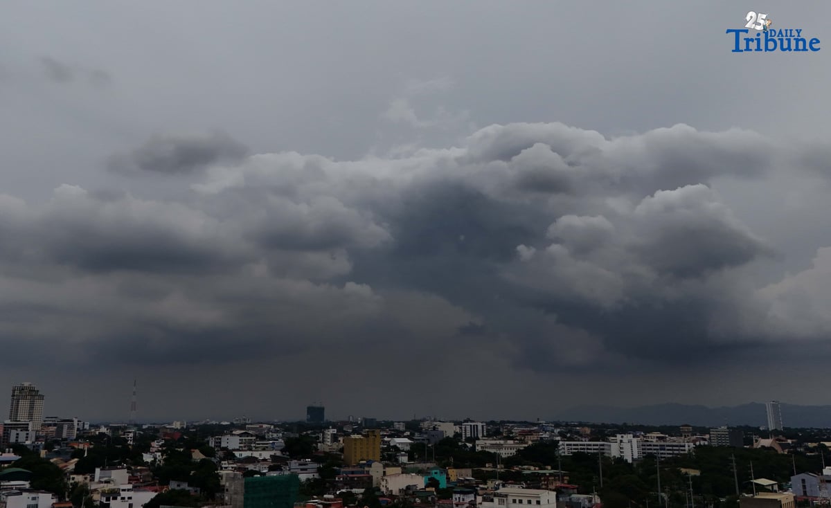 Dark clouds blanket Metro Manila’s skyline, as seen from Quezon City on Saturday, ahead of the possible entry of Severe Tropical Storm Pudol into the Philippine Area of Responsibility by Sunday evening or Monday afternoon, according to PAGASA.