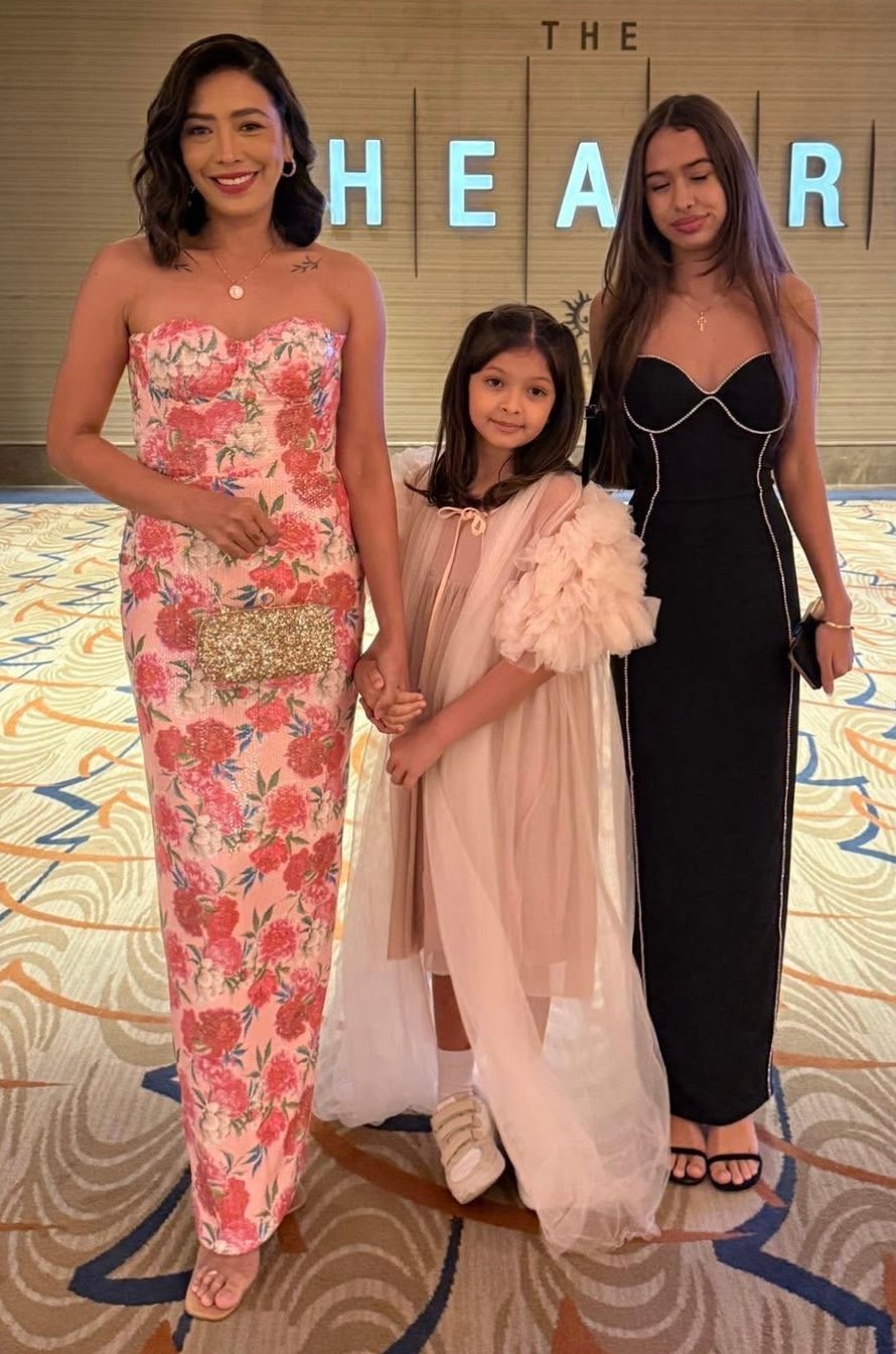 Marie Field-Faith with daughters, Isla and Sophie.