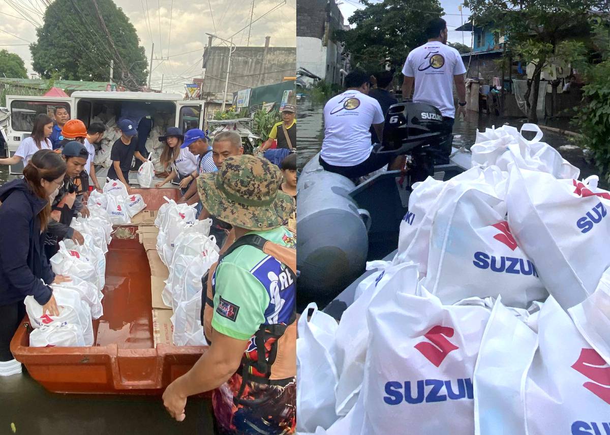SUZUKI teams and local responders load relief goods onto boats bound for flood-hit neighborhoods.