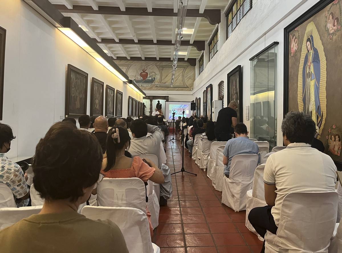 Conference at San Agustin Church.