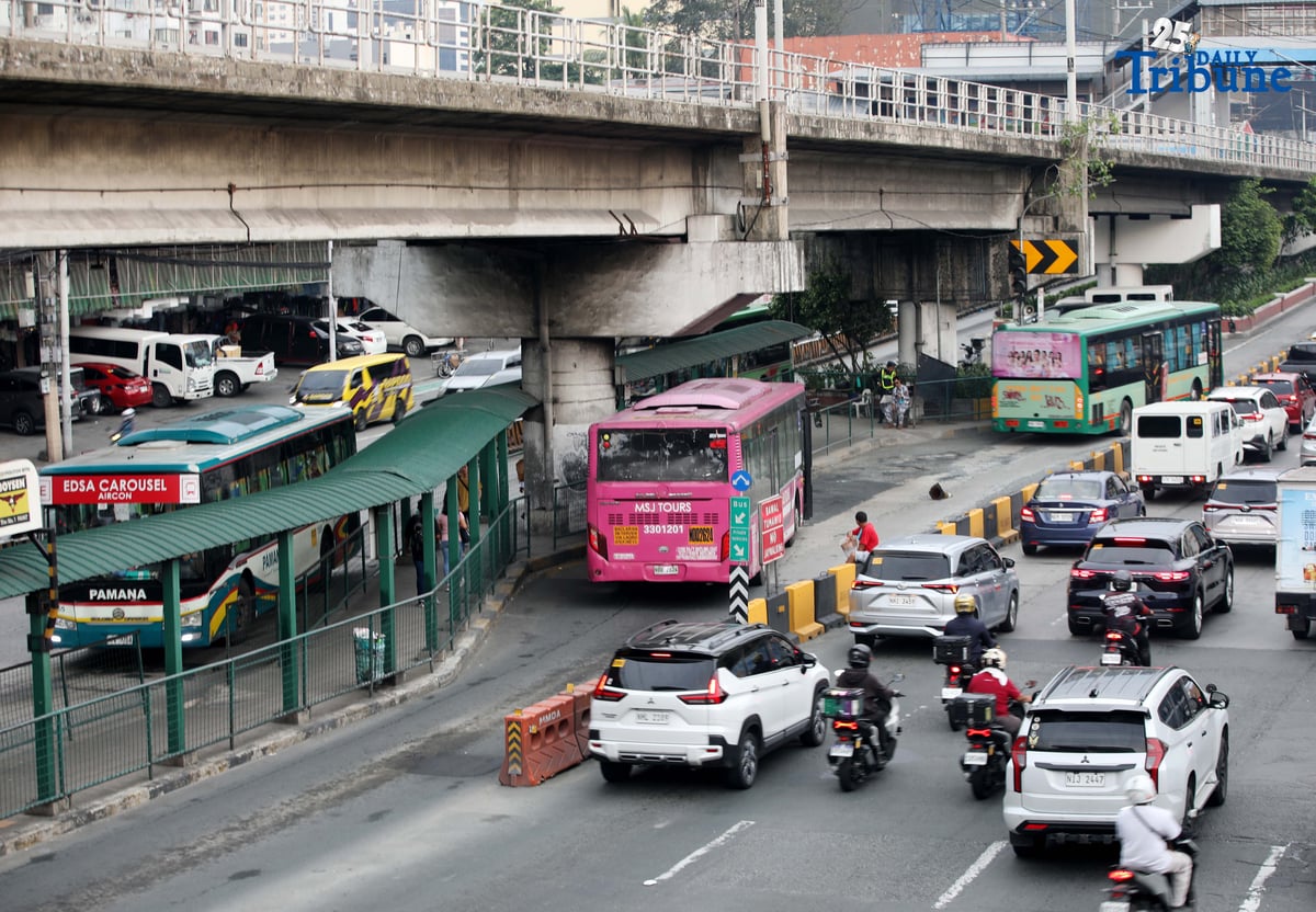 Passengers wait at the Nepa Q-Mart Bus Station in Quezon City on August 11, 2025. Transportation Secretary Jaime Bautista said in an interview that the busway rehabilitation project is now underway