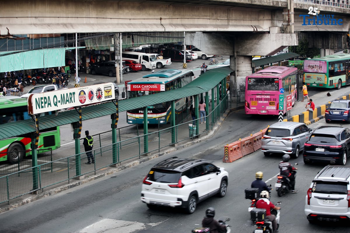 Passengers wait at the Nepa Q-Mart Bus Station in Quezon City on August 11, 2025. Transportation Secretary Jaime Bautista said in an interview that the busway rehabilitation project is now underway