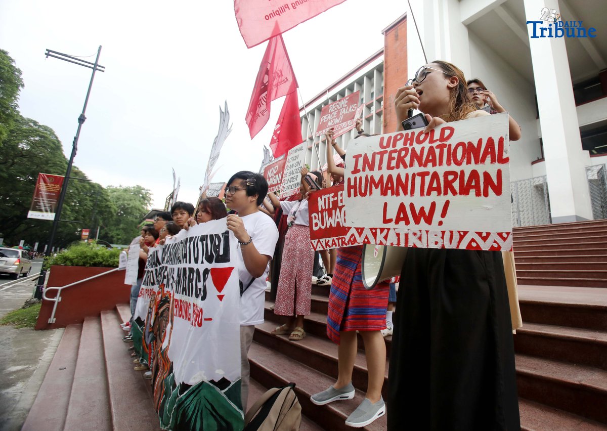 Members of the IP group Katribu stage a protest in front of Palma Hall at UP Diliman, Quezon City, on Tuesday, August 12, 2025, to mark the International Day of the World’s Indigenous Peoples.
