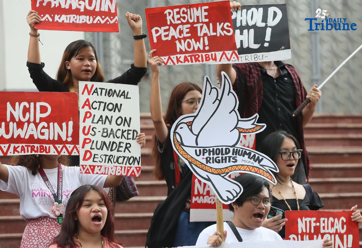 Members of the IP group Katribu stage a protest in front of Palma Hall at UP Diliman, Quezon City, on Tuesday, August 12, 2025, to mark the International Day of the World’s Indigenous Peoples.