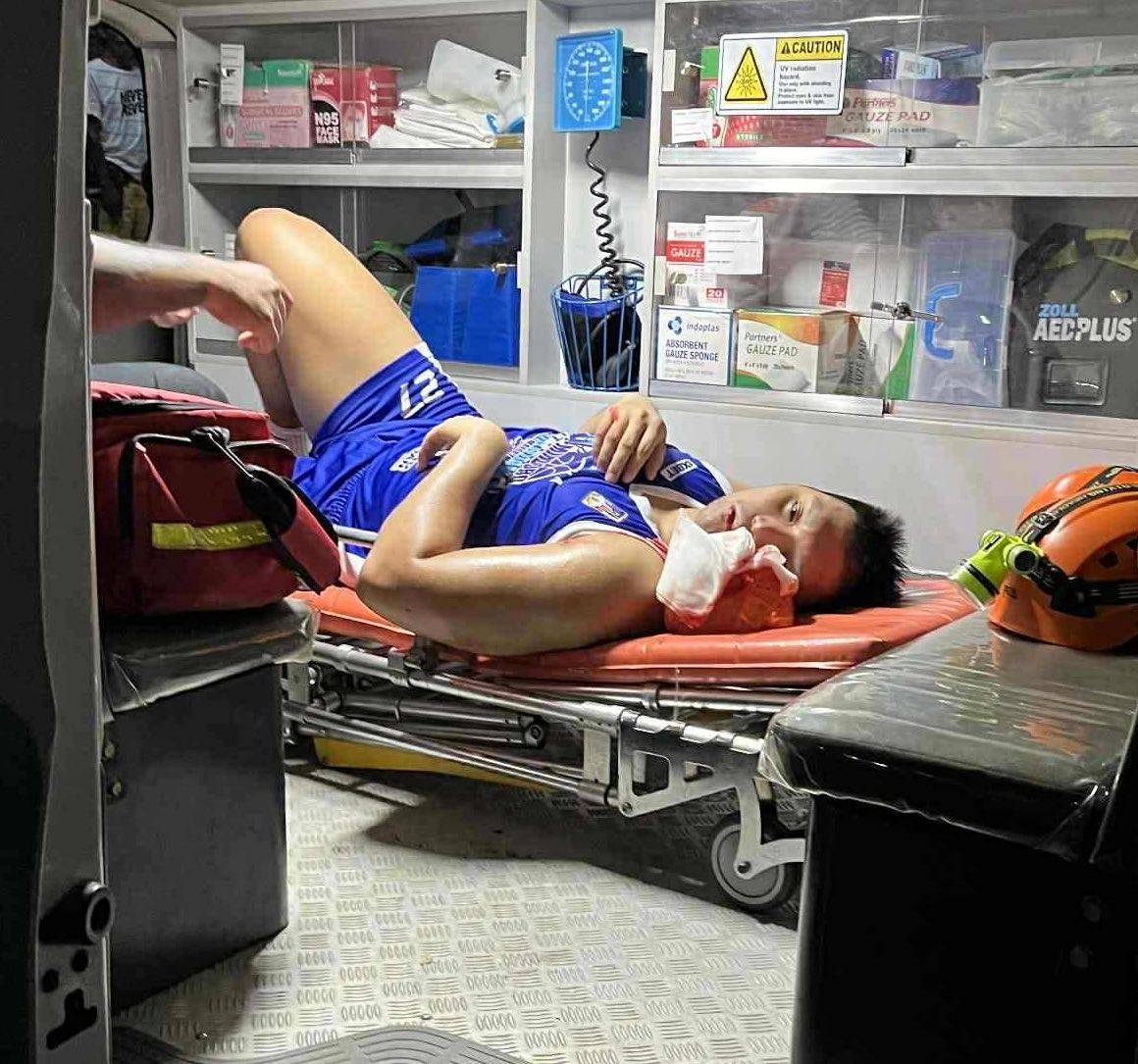 Jonas Tibayan as he is being brought to a hospital