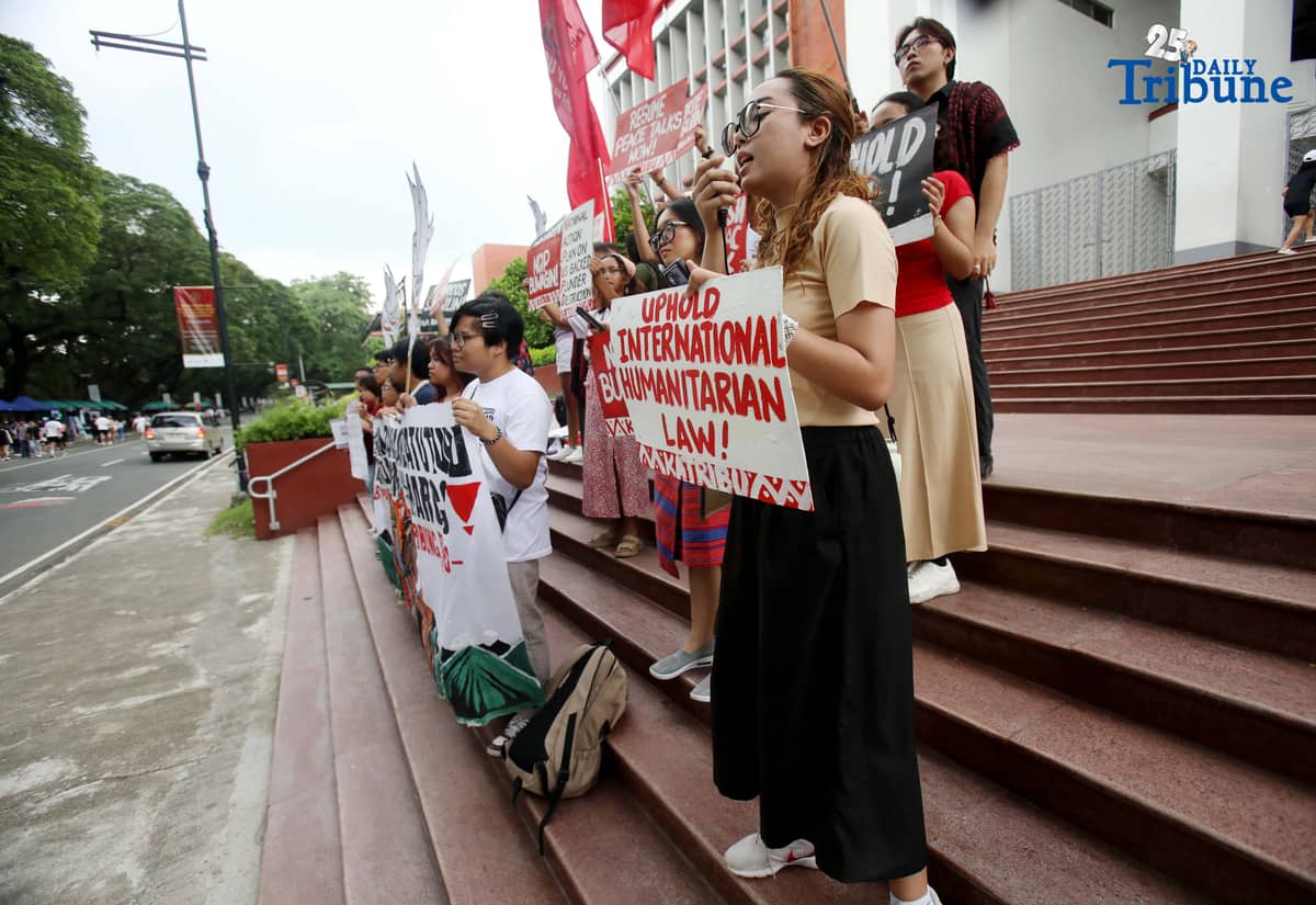 Members of the IP group Katribu stage a protest in front of Palma Hall at UP Diliman, Quezon City, on Tuesday, August 12, 2025, to mark the International Day of the World’s Indigenous Peoples.