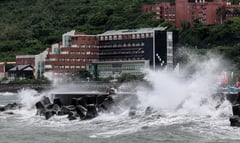 Typhoon Podul pummels Taiwan, heads towards China